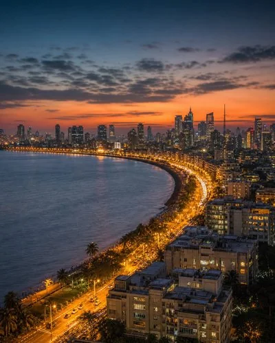 Mumbai skyline at dusk with Marine Drive and the Arabian Sea
